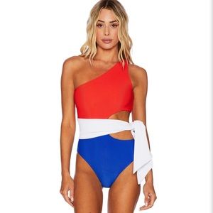 BRAND NEW. Never worn. Beach Riot color block suit
